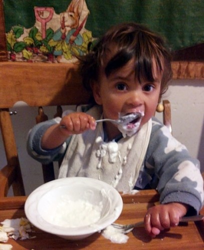 Finley eats yogurt. Son of recently rejoined member River. 
