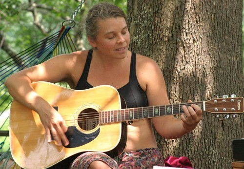Talent Show: Apple on guitar.